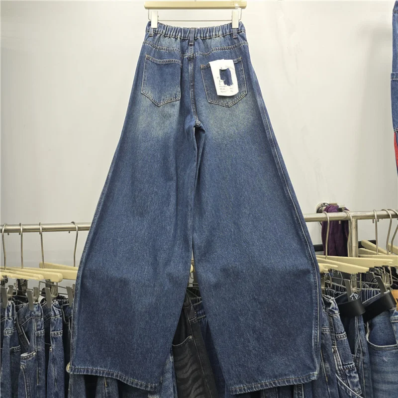 QICHE 2026 Autumn New Women Retro Asymmetric Spliced Denim Jeans Loose Wide‑Leg Floor‑Length Casual Long Trousers