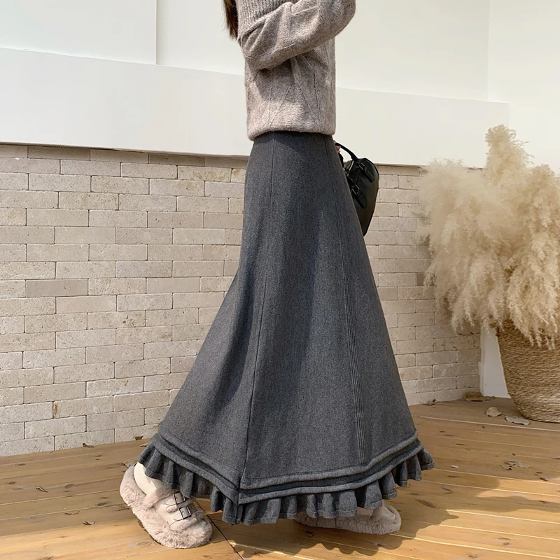 2025 한국 버전 가을 겨울 신축성 있는 허리 플리츠 스커트 하프 스커트 슬림 스커트 페어리 솔리드 심플 오피스 니트 A라인