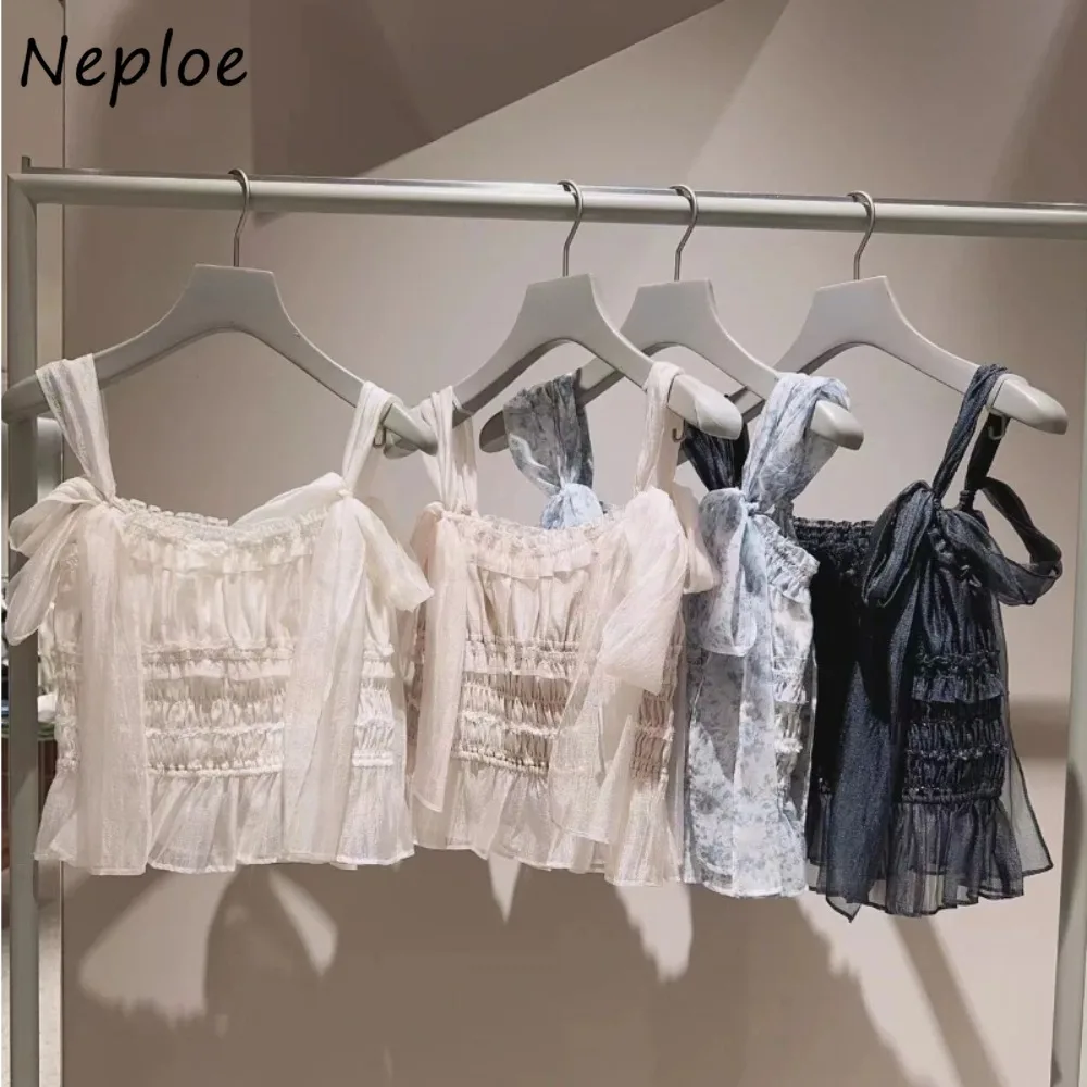 Neploe เสื้อเชิ๊ตแขนกุดคอเหลี่ยมสำหรับฤดูร้อนใหม่เสื้อเบลาส์ผูกโบว์แบบลำลองเข้าได้กับทุกชุดเสื้อสายคล้องคอจากญี่ปุ่น