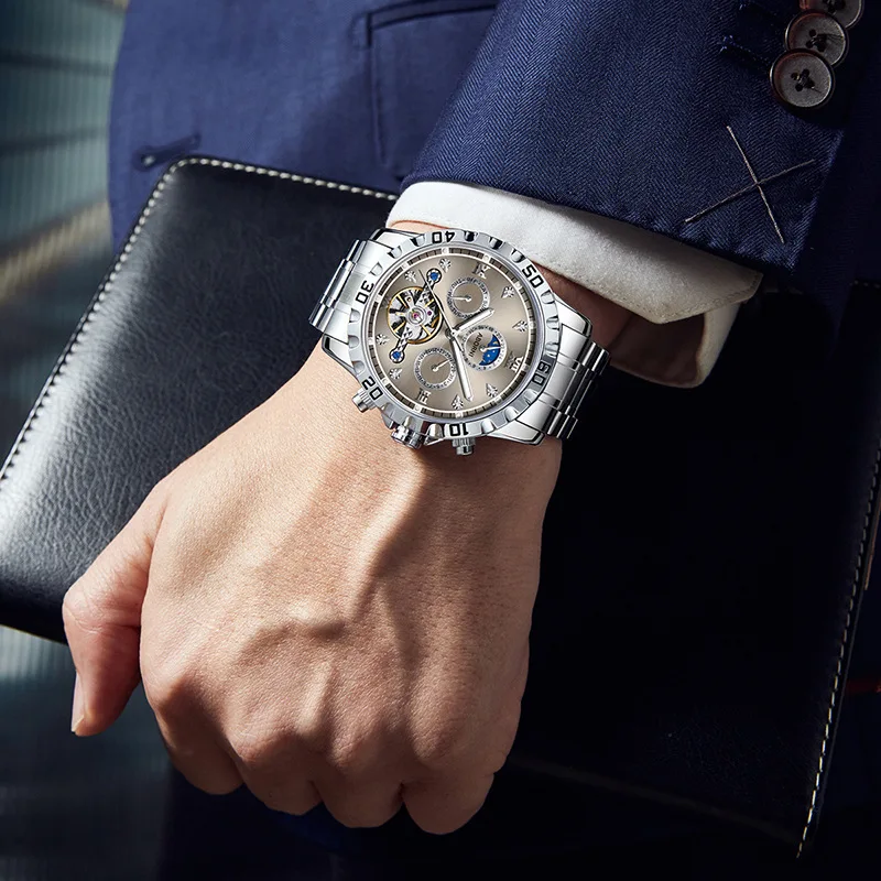 Reloj mecánico Tourbillon a la moda para hombre, reloj luminoso de acero inoxidable con fecha, semana, fase lunar, reloj hueco automático de lujo para hombre