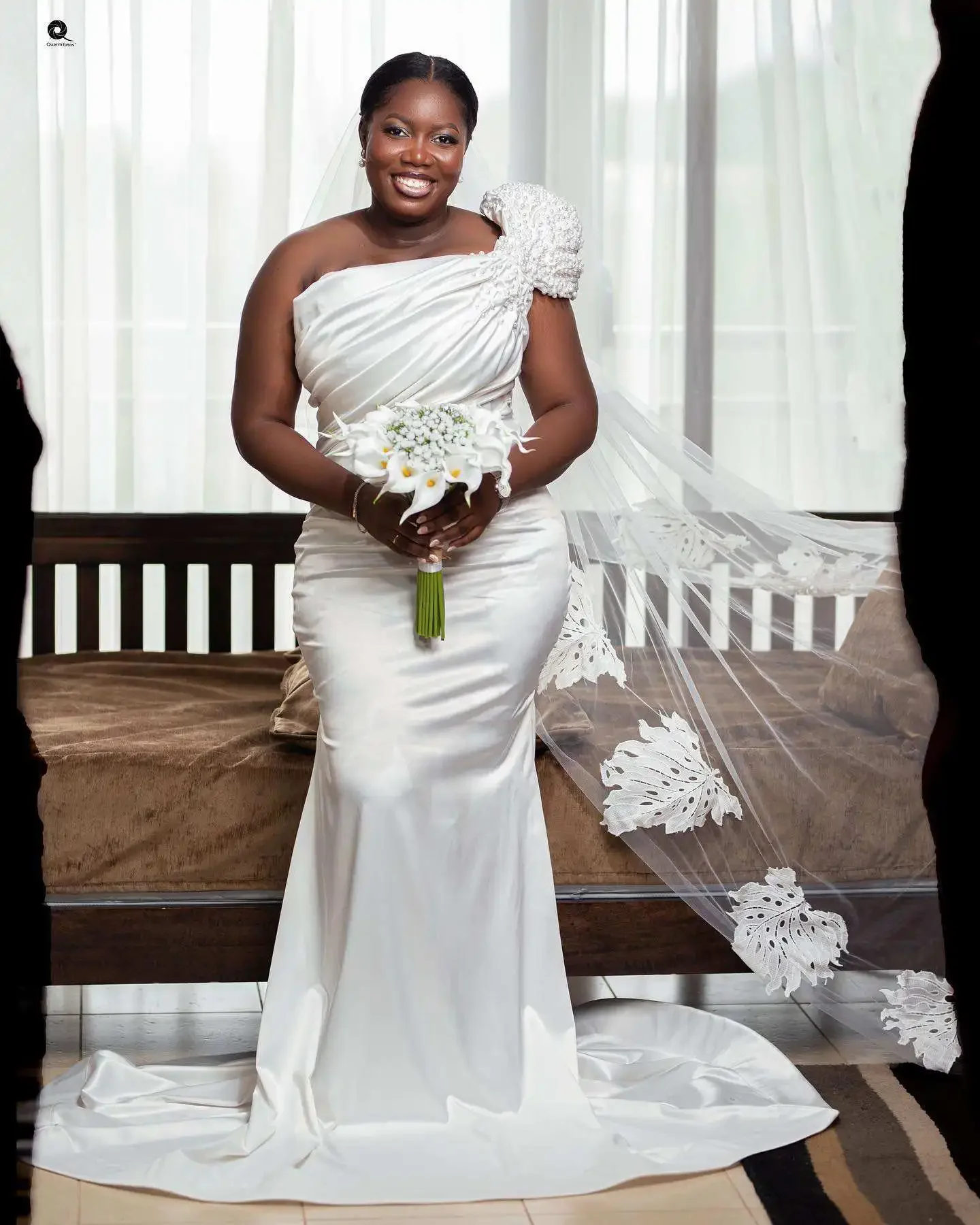 Customized Elegant White Mermaid Wedding Dress with Lace Detailing and Train