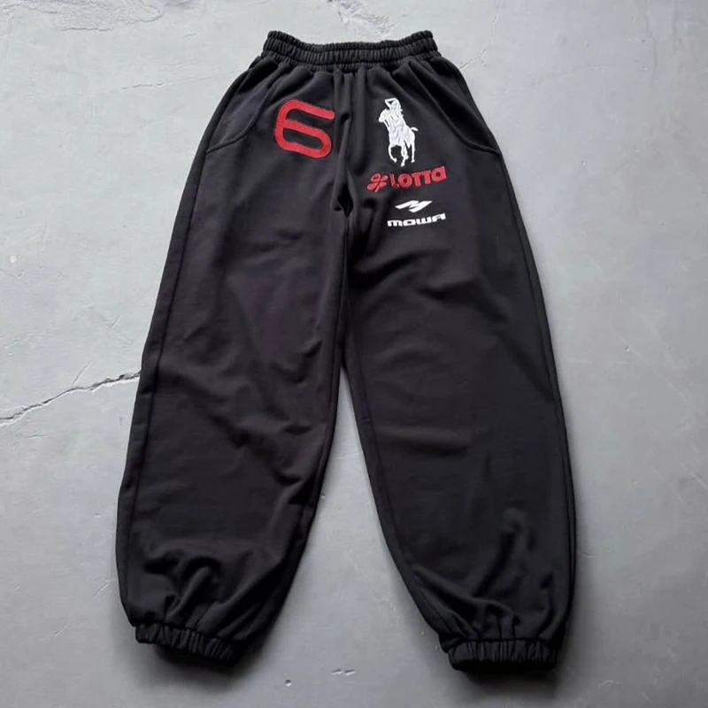 

Спортивные брюки Mowalola: свободные повседневные брюки с эластичным поясом и манжетами в стиле High Street