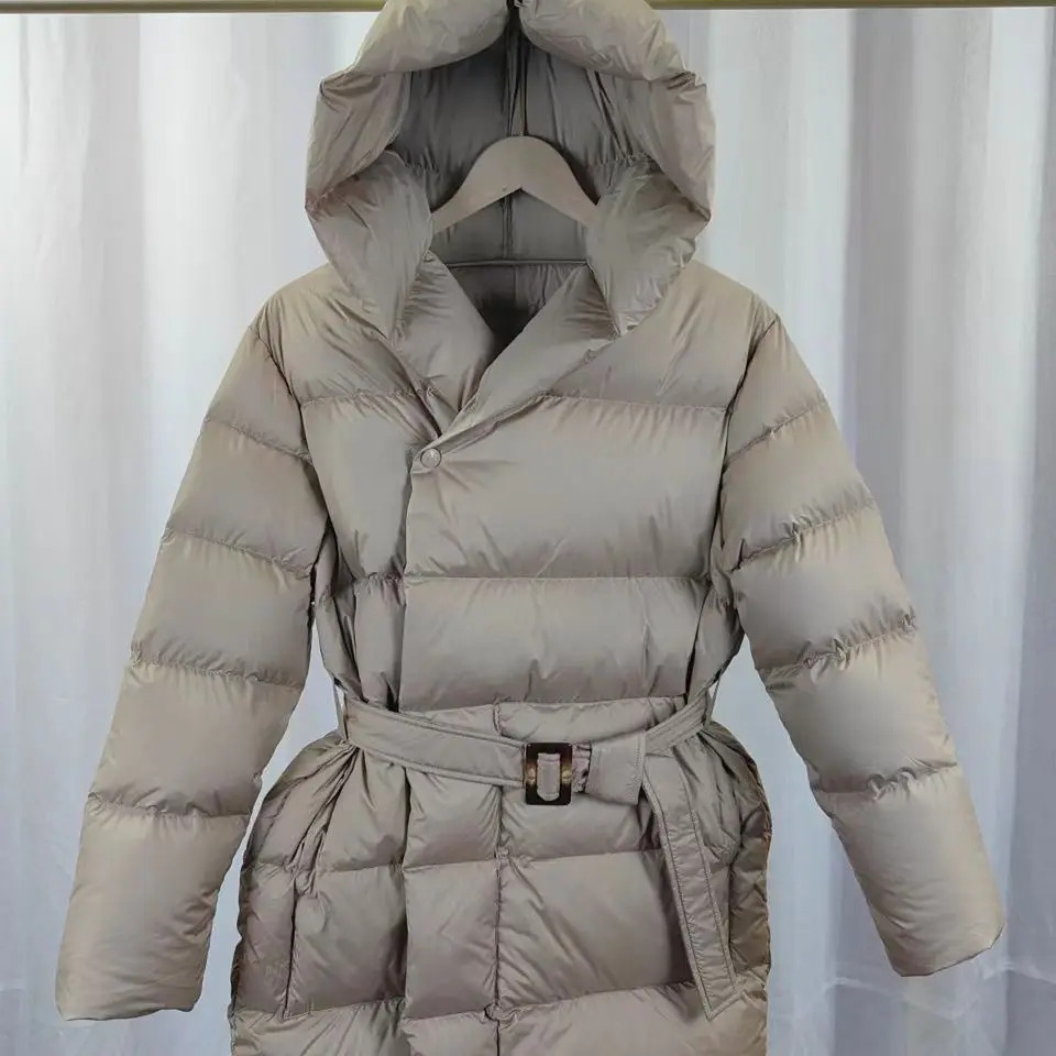 Gagarich luxo cintura cinched jaqueta feminina 2024 novo inverno meados de longo estilo grosso moda com capuz quente sólido parkas na moda