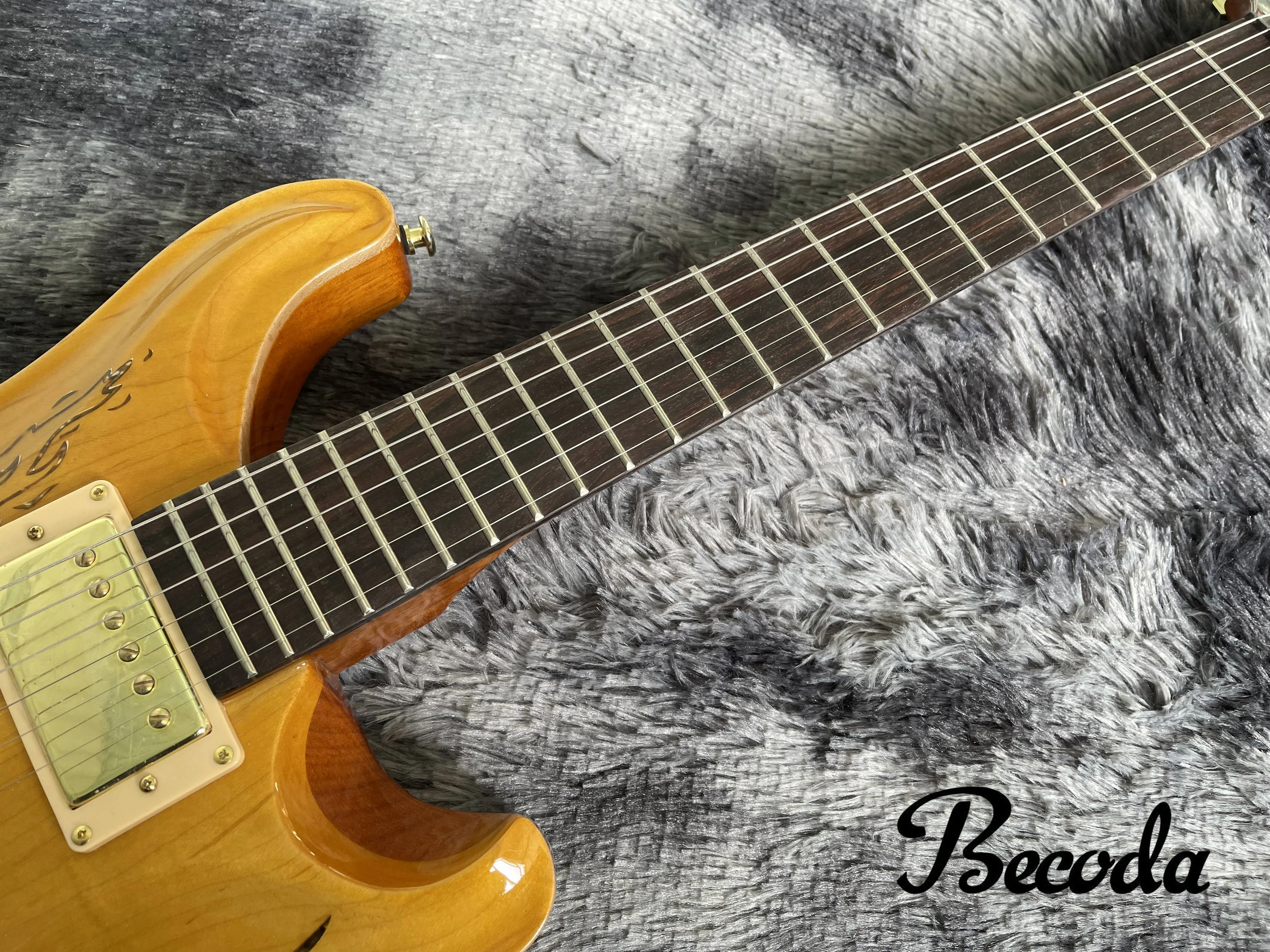 China Becoda OEM  Electric Guitar PR sguitar Dragon body maple top, in stock.