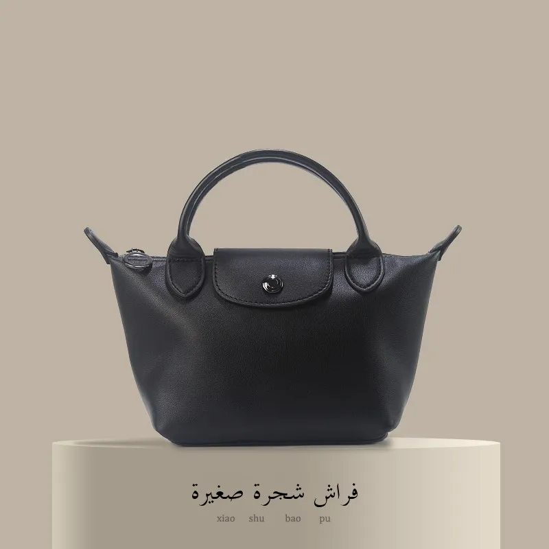 

High Quali Cowhide Leather Dumpling aped Crossbody Bag Women's Single oulder Handbag Small Size Commuter Bag
