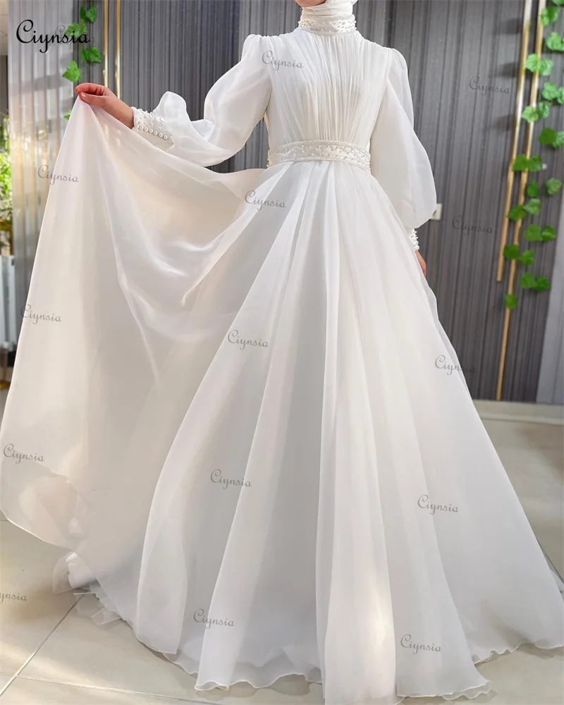 

Ciynsia A-Line Hijab Muslim Wedding Gown 2024 Vestido De Noiva Long Sleeves High Neck Pearls Organza Dubai Arabic Bride Dress