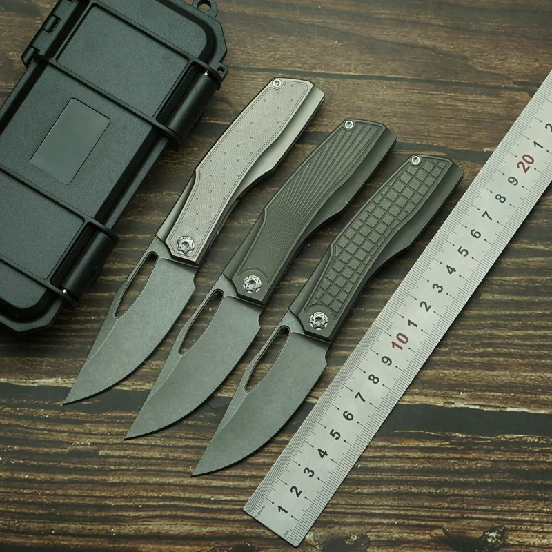 2025 جديد بروتين جوفاء طحن 60 + HRC 154 سنتيمتر شفرة التيتانيوم مقبض النحاس طوقا جيب EDC أداة التخييم في الهواء الطلق سكين للفرد
