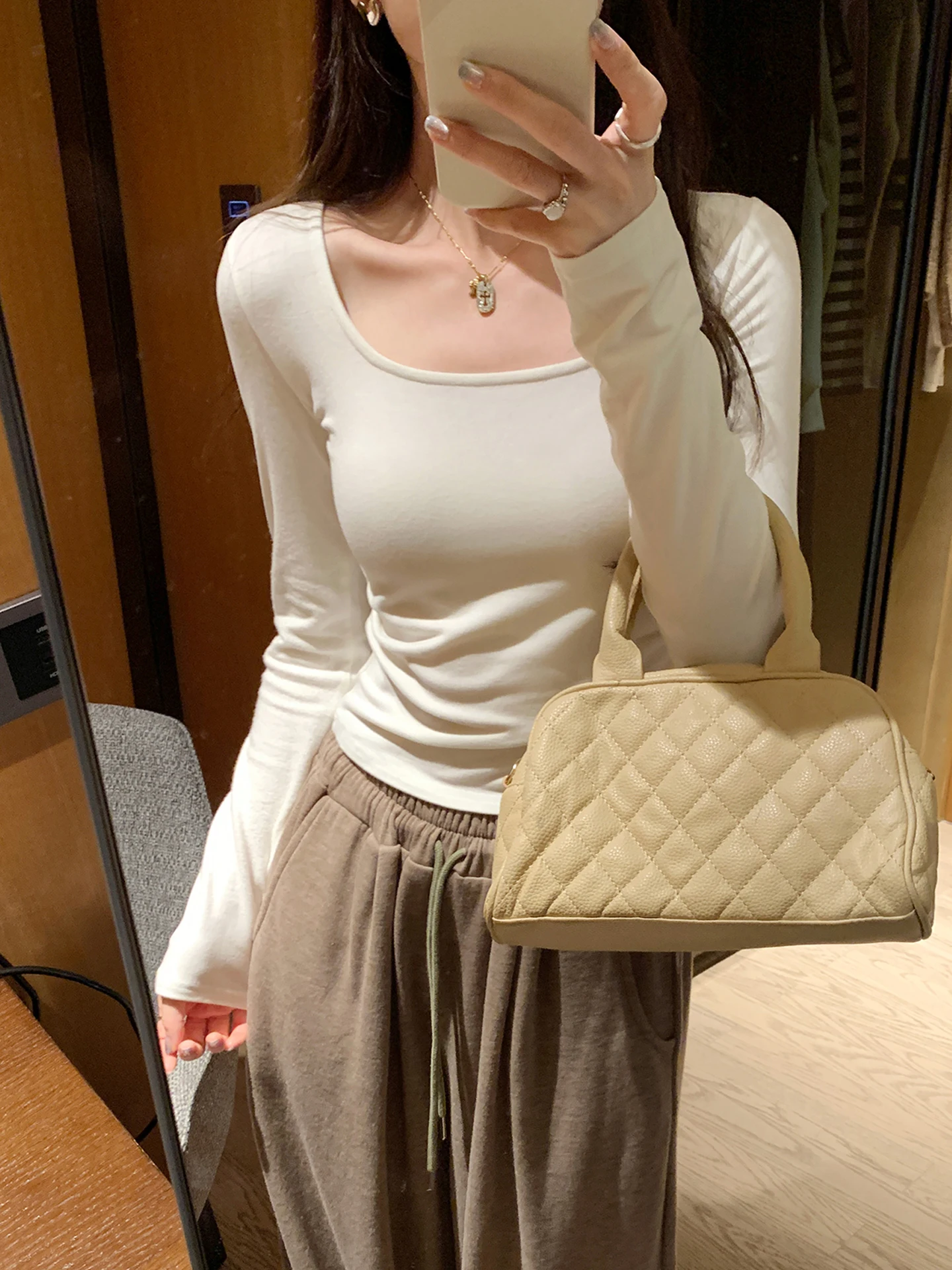 レディース ロングスリーブ Tシャツ 韓国風 ウエストシェイプ スクエアカラー プリーツベース おしゃれ ユニーク 美しいトップス