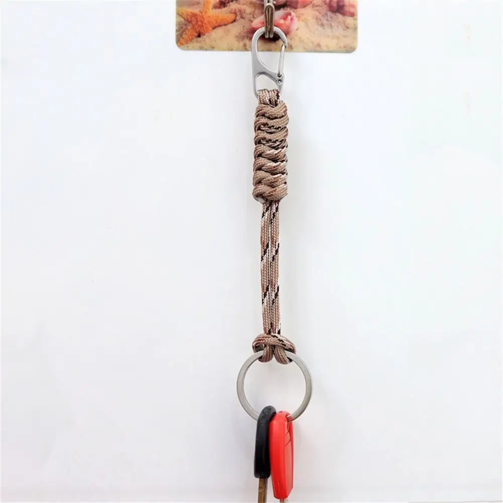 اليدوية Paracord المفاتيح مكافحة خسر سلسلة في الهواء الطلق حبل مظلة حبل كيرينغ ثعبان عقدة ظهره مشبك مضفر المنسوجة المفاتيح