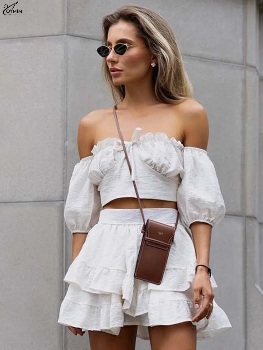 Oymimi أنيقة الأبيض 2 قطعة مجموعة للمرأة الصيف حمالة قصيرة الأكمام الدانتيل متابعة المحاصيل القمم وارتفاع الخصر مطوي التنانير مجموعات