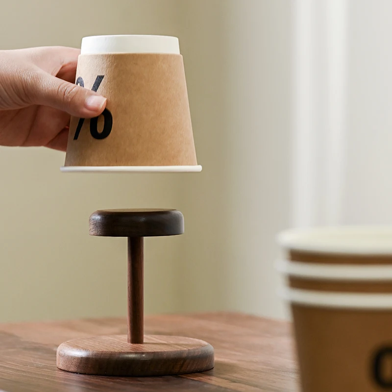 

Disposable cup picker Walnut rack High value paper cup holder Solid wood cup holder Coffee corner arrangement