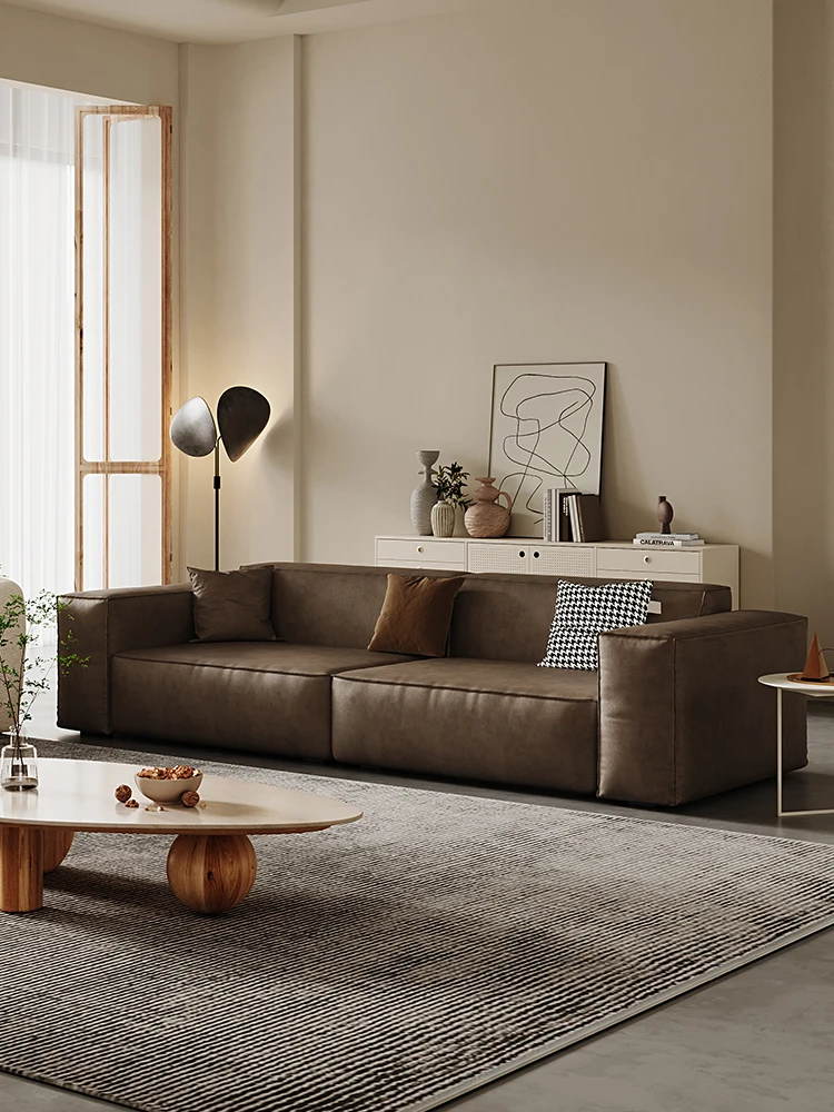 

Medieval wabi-**** wind first-layer cowhide straight-row sofa minimalist retro tofu block small apartment living room