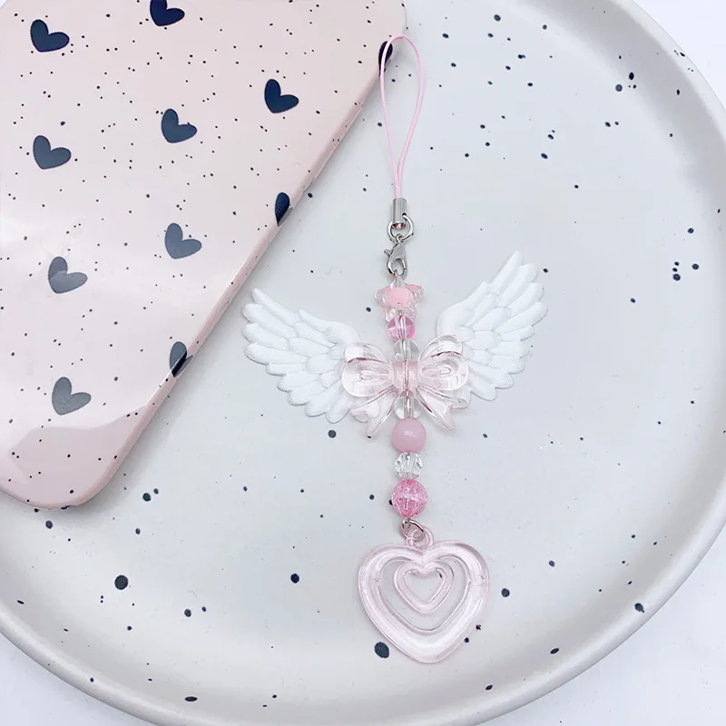 Novas lindas asas arco coração alça móvel pingente de telefone corrente para meninas mulheres doce chaveiro sacos acessórios decorativos presentes