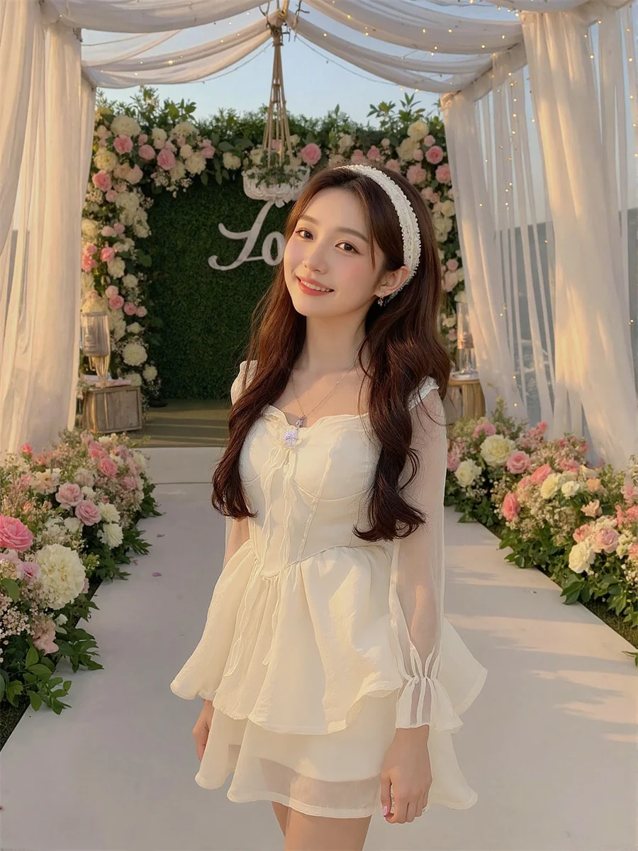 فستان نسائي أبيض بفيونكة على شكل حرف a بلون سادة وأكمام مضيئة ورقبة على شكل حرف v من التل المطرز بتفاصيل دائرية رائعة للسيدات طويلة