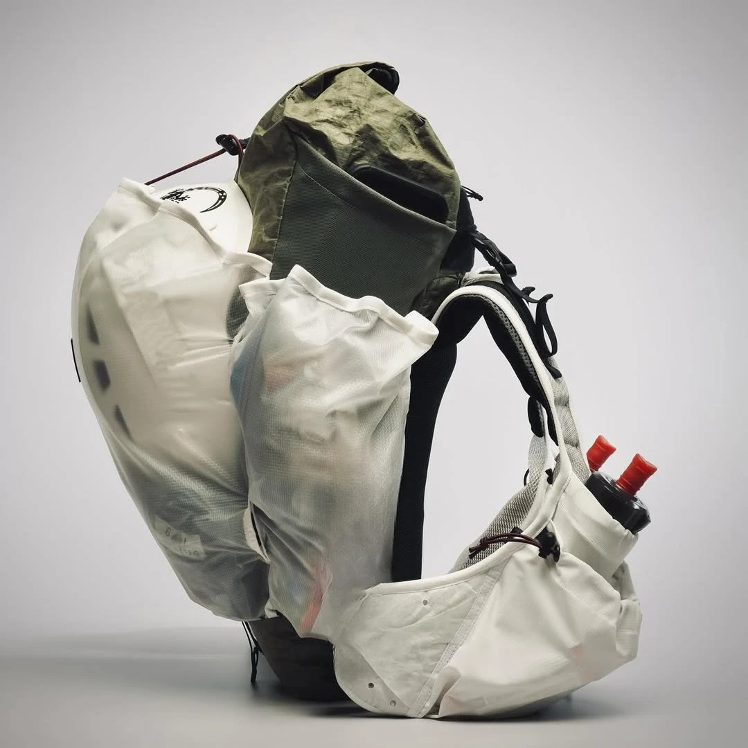 2025 new outdoor crude benzene ultra-light waterproof mountaineering trail running expansion camping bag multi-function