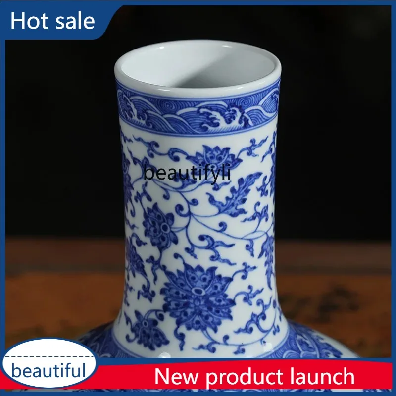 

A029 Сине-белая бутылка с витыми ветками и цветочным узором, небесный шарик, рот 8, высота 35, диаметр живота 22