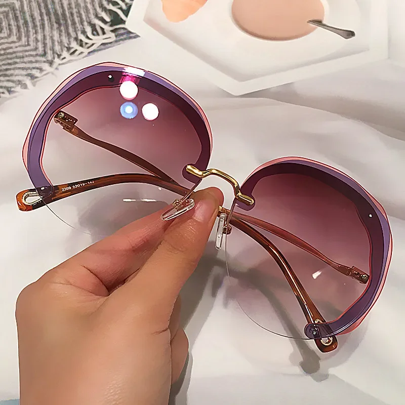 

New Luxury Brand Gradient Oversize Sun Glasses Female Alloy Cat Eye Shade Unique Multi-storey Rimless Round Sunglasses for Women