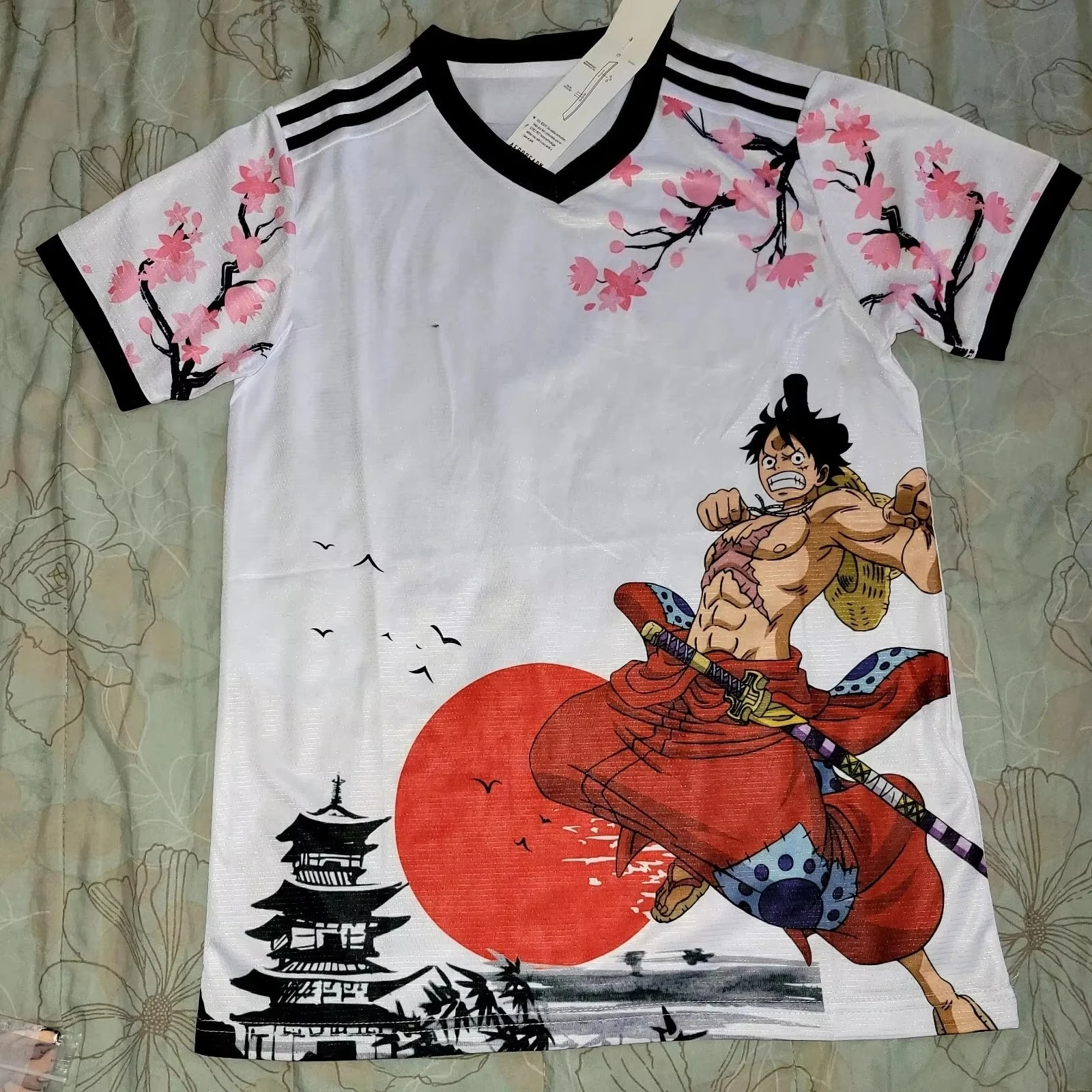 2026 Anime One Piece Monkey D. Luffy Fußballtrikot T-Shirt Sommer Anime Freizeit-Sport-T-Shirt Geeignet für Männer und Frauen