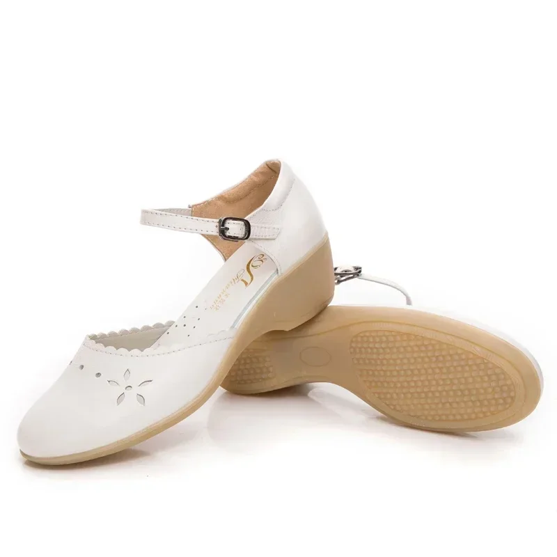 Nurse female soft sole summer breathable non-slip beef tendon wedge heel white hollow heel bag head sandals a pair