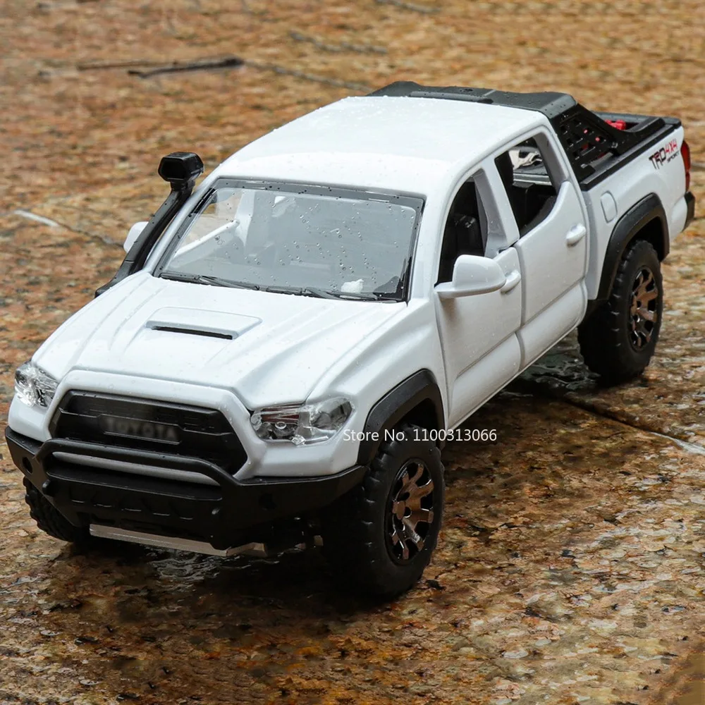 Jouets Tacoma en alliage 1:32, modèles moulés sous pression, voitures avec musique légère, pneus miniatures en caoutchouc, véhicules pour enfants, cadeaux de noël