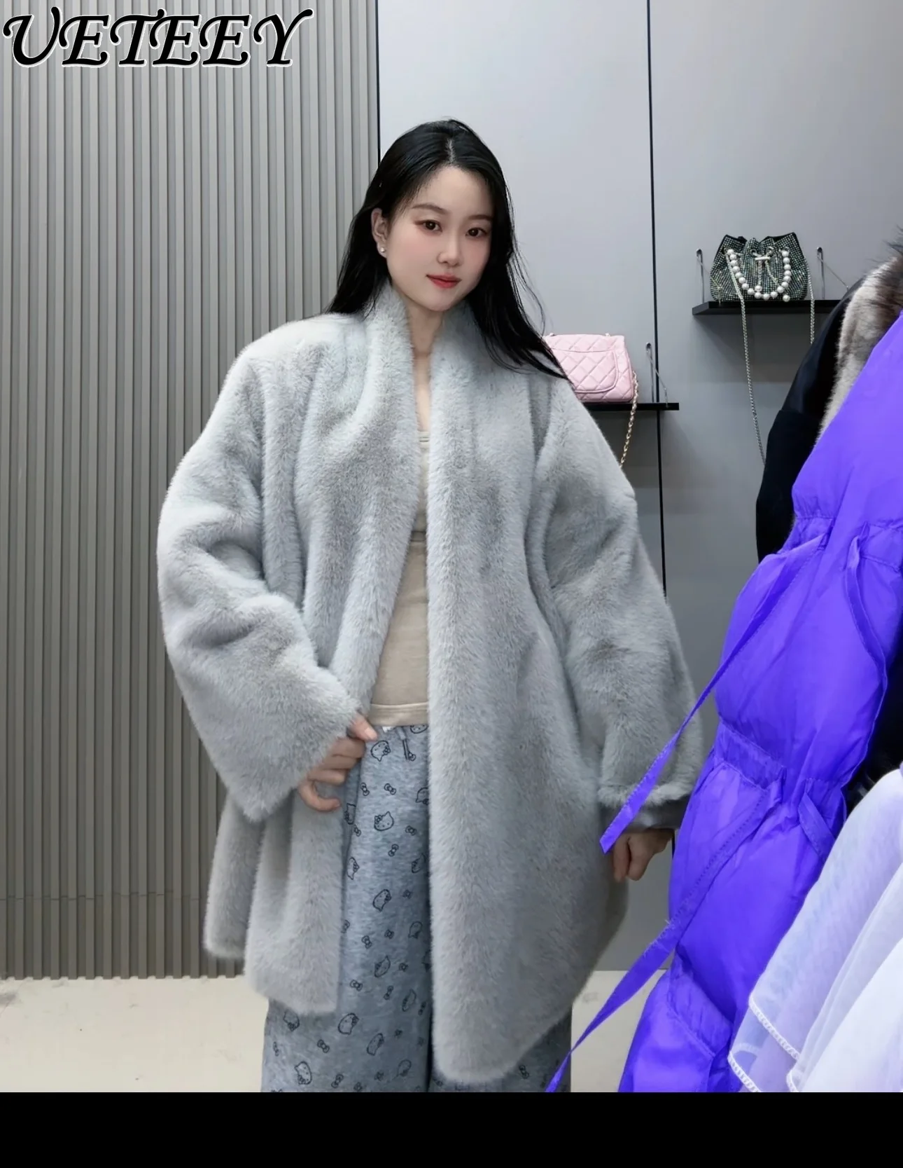 

Лидер продаж, зима 2025, экологически чистая шуба из меховой кожи, интегрированное теплое модное свободное пальто средней длины с благородным темпераментом