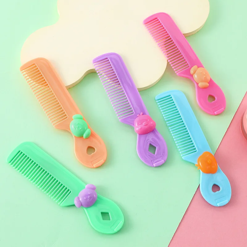 Cute children\'s mini comb cartoon portable portable round head tooth comb for broken hair with bangs little girl party toy