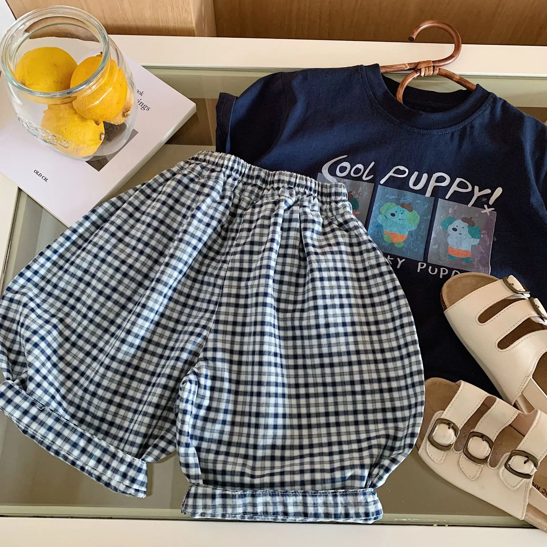Boys' mid length pants 2026 summer new Korean version children's checkered five quarter boys' loose pants trend