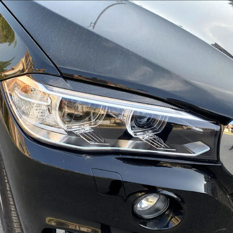 

2pcs ABS Carbon Fiber Texture/Glossy Black Car Headlights Eyebrow Eyelids Cover Trim For BMW X5 X6 F15 F16 2014 2015 2016-2018