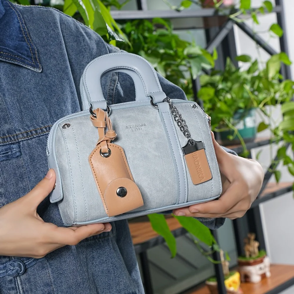 2025 جديد يده حقيبة تحت الإبط بوسطن حقيبة المرأة العصرية موضة عالية الجودة يده وسادة حقيبة الرياح الجنوبية حقيبة الموضة