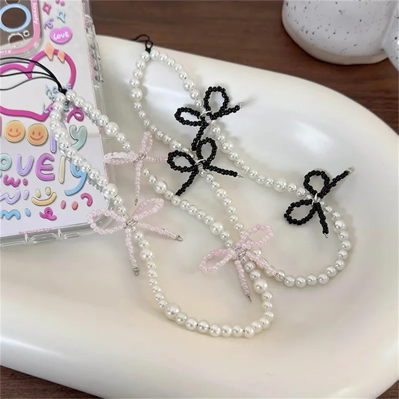 Korean Cute 3D Bowknot Pearl Beaded Phone Chain For iPhone 16 Camera Accessories Hanging Rope Anti-Lost Lanyard Hanging Jewelry