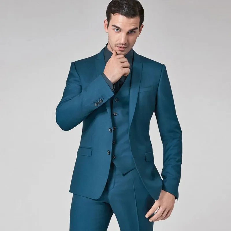 

Teal Mens Suits Slim Fit Groomsmen Wedding Tuxedos Three Pieces Groom Suit Peaked Lapel Celebrity Formal Blazers With Jacket Ves