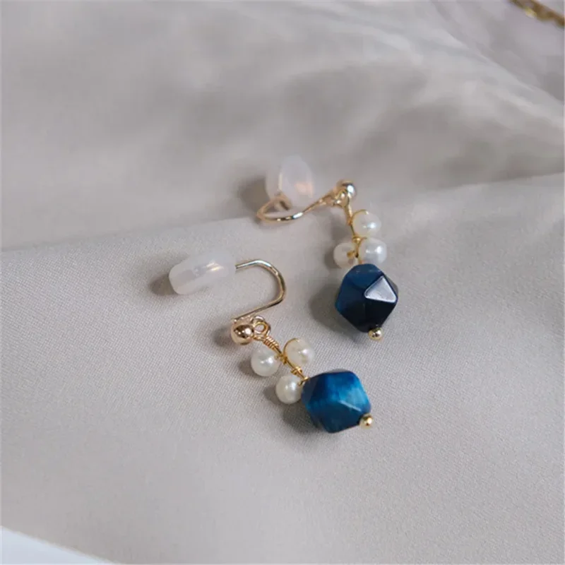 Anting-anting Pesta indah wanita anting-anting indah romantis klip telinga mutiara alami batu mata harimau biru buatan tangan desain asli