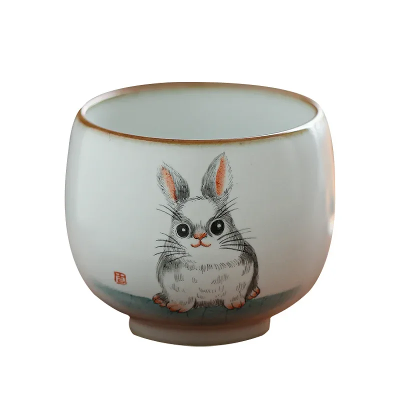 

Jingdezhen hand-painted begonia cute rabbit cup Ru kiln opening can raise ceramic teacup Kung Fu tea tea tasting cup