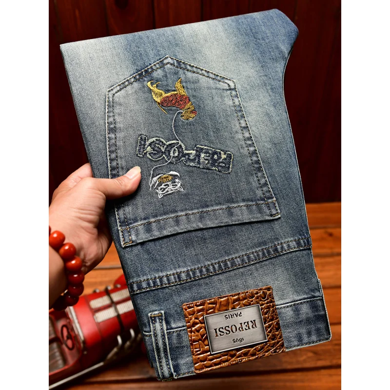 جينز عالي الجودة للرجال صيفي قابل للتمدد من قماش الدنيم بتصميم كلاسيكي عصري ومطرز بطباعة كاجوال بقصة ضيقة وسراويل طويلة للقدم الصغيرة