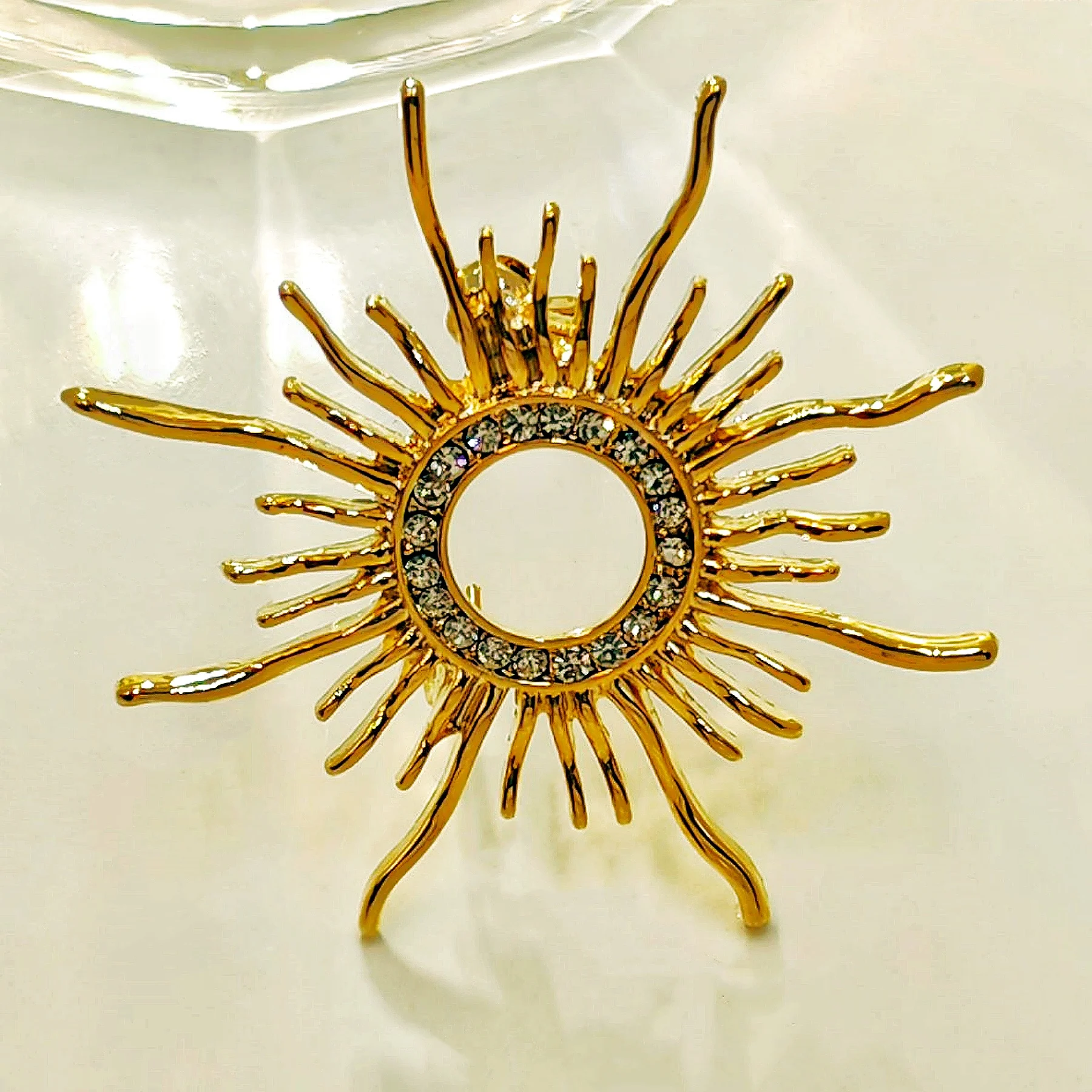 

Shiny Crystal Accent Flaming Golden Sun Brooch Pin Solar Eclipse Jewelry