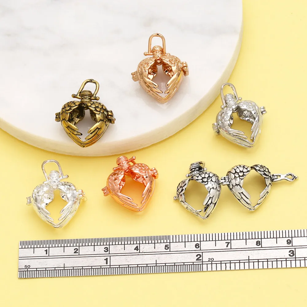 OCESRIO Retro Hollow Angel Wing Harmony Ball Chime Bola Necklace Pendant for Pregnancy Copper Gold Plated Wishing Ball pdtb477