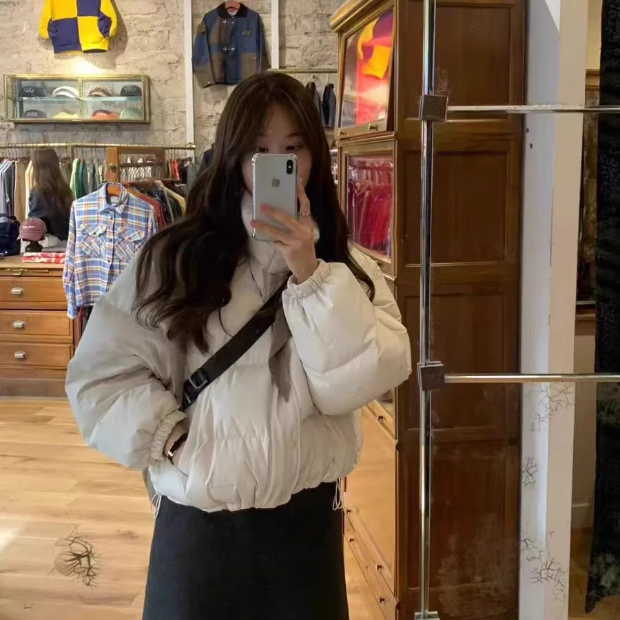 따뜻한 온스 루즈핏 순색 스탠드 칼라 화이트 다운 경량 따뜻한 겨울용 여성 자켓