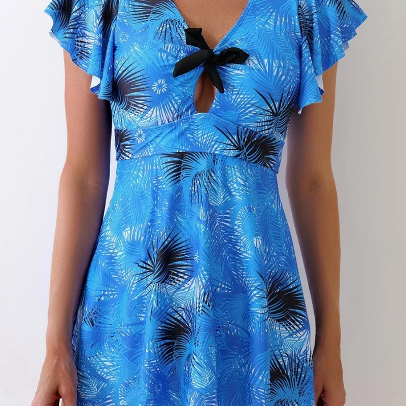 

Женский раздельный купальник-танкини с треугольными плавками, скрывающий живот, с эффектом похудения и модным принтом.