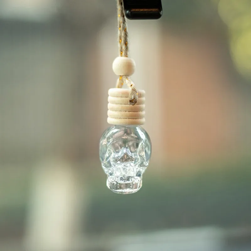 Car Skull Perfume Bottle Ornament Aromatherapy Essential Oil Bottle Hanging Auto Air Freshener Decoration Interior for Home