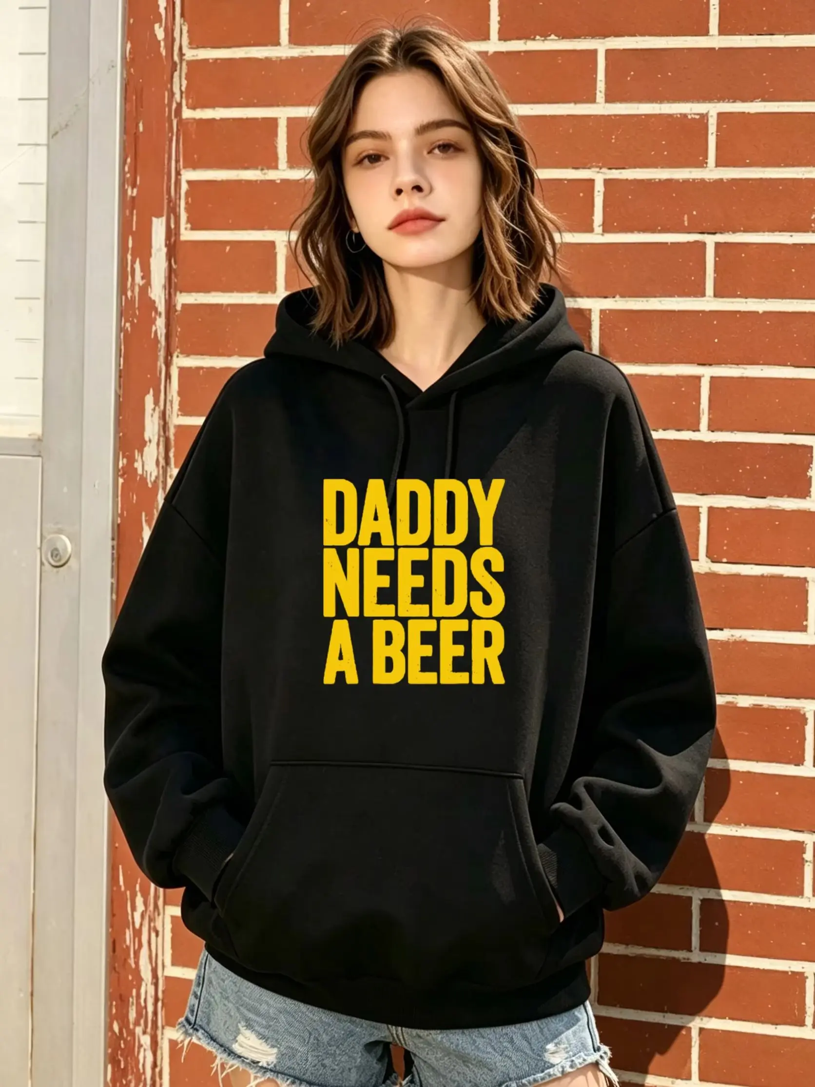 

Women's Black Oversized Hoodie with yellow letter print, casual & trendy for fall and winter daily wear.