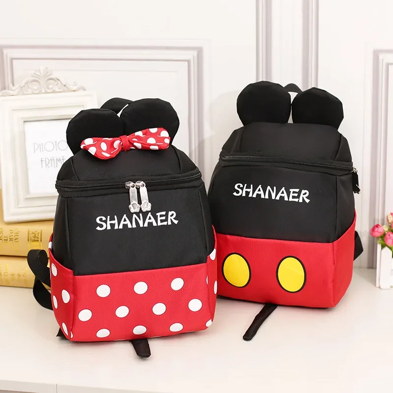 

Disney Mickey Minnie 2024 Children's School Bag Boys And Girls 12-16 Years Old Lightweight Load Reduction Cartoon Bag Opening Gi