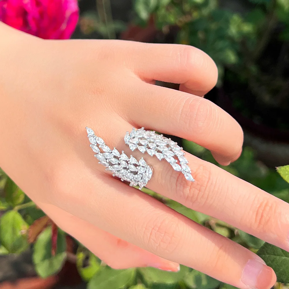 CWWZircons New Trendy Angel Wing Bling White Cubic Zirconia Open Cuff Adjustable Long Finger Ring for Women Wedding Evening R272