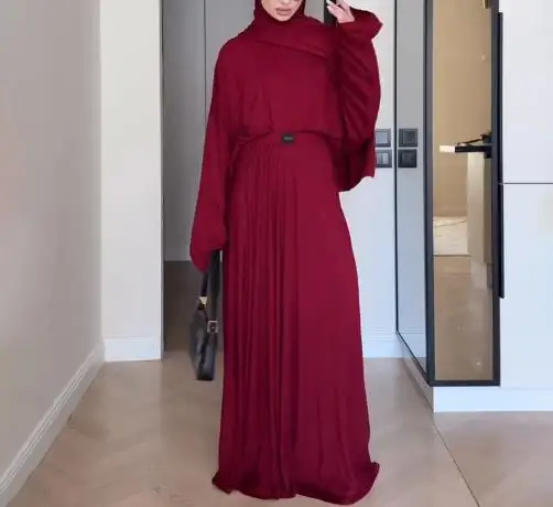 Ensemble deux pièces pour femmes, couleur unie, col haut, manches longues, haut ample et jupe longue pliée décontractée, nouvelle collection printemps automne 2025