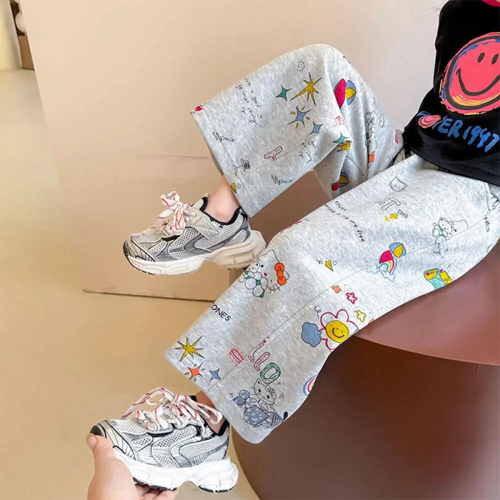 

Детские повседневные брюки Sanrio Hello Kitty с граффити, новинка 2026 года, весенне-осенняя одежда для девочек, прямые брюки в корейском и западном стиле