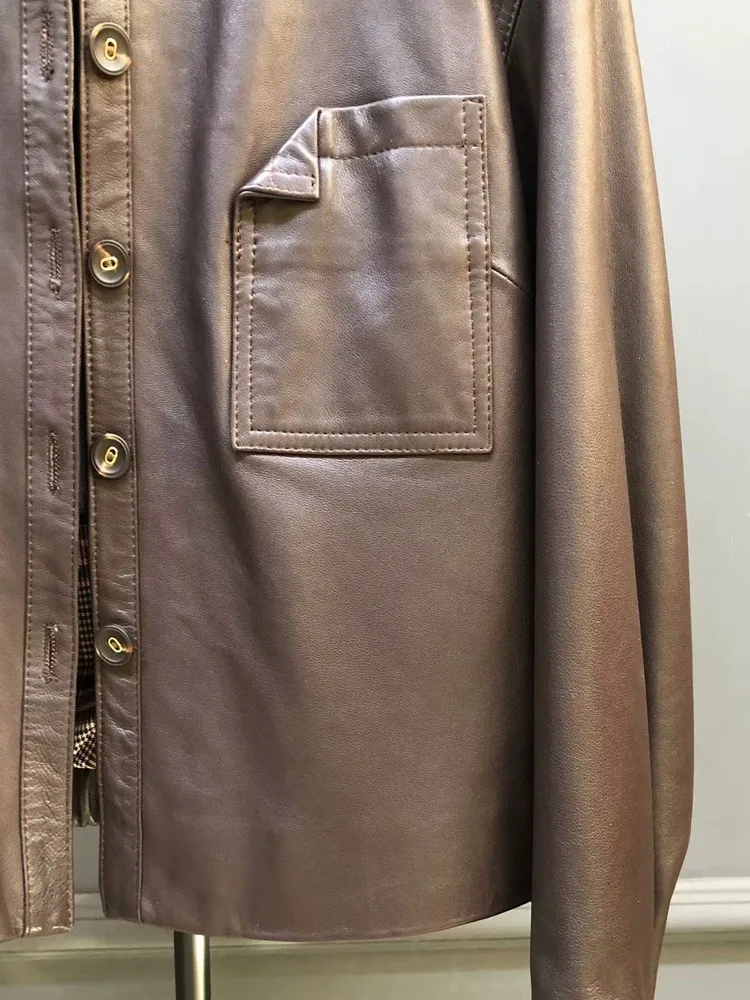 سترة منفوخة بلون سادة من الجلد الطبيعي على الطراز الكوري فضفاضة وجيب واحد الصدر وأكمام طويلة من جلد الغنم ملابس خارجية للسيدات