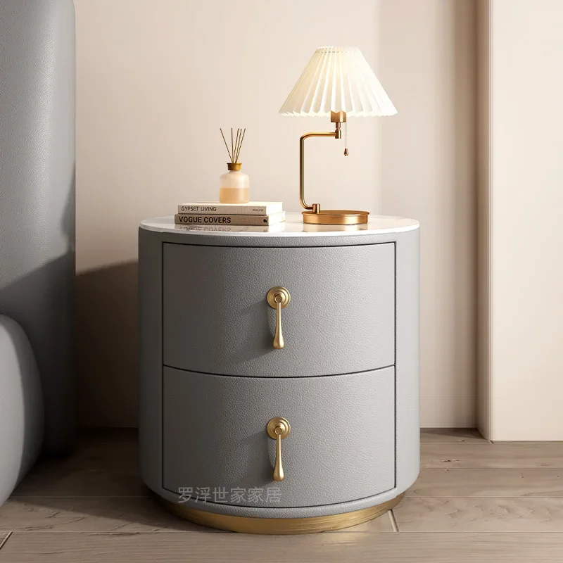 Light luxury bedside table Round modern simple small bedside table Bedroom advanced rock slab solid wood leather bedside table