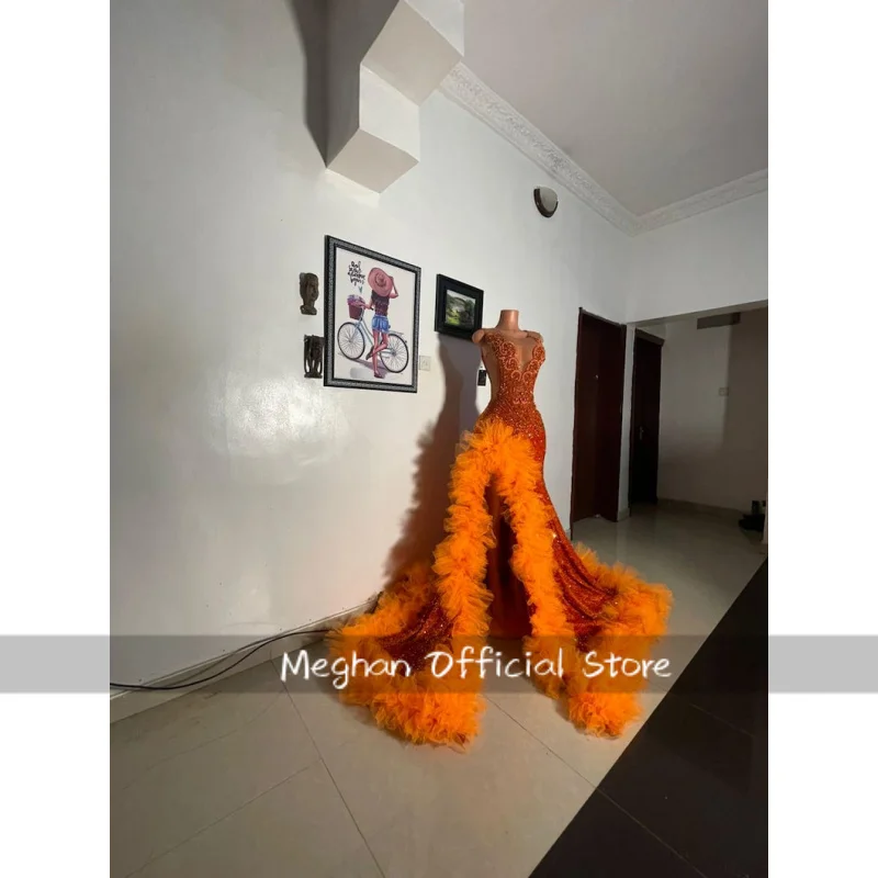 

Open slit orange prom dress