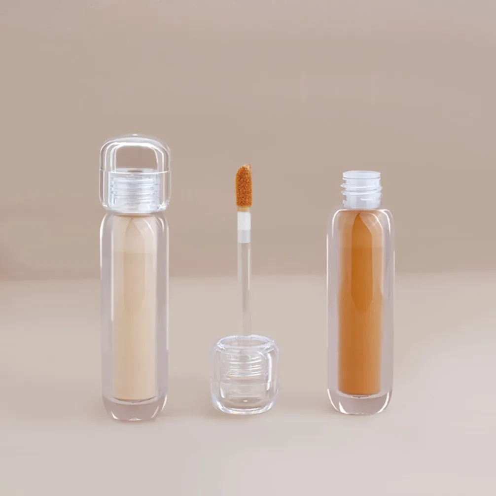 Paleta płynnych korektorów w przezroczystych butelkach, 18 kolorów, pełne krycie, wodoodporne, private label, własne logo, wegański makijaż, sprzedaż hurtowa.