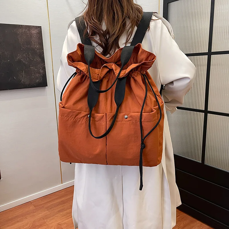 2025 New Casual Solid String Style Nylon Backpacks Fashion Large Capacity High Quality Designer Style Personality Shoulder Bags