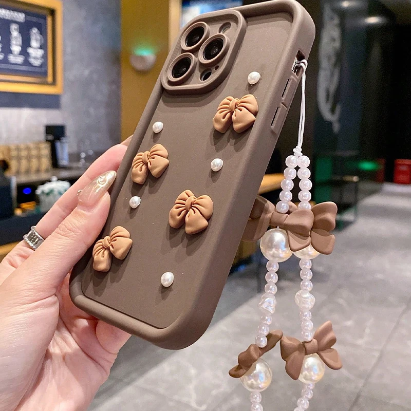 Custodia per telefono in silicone coreano 3D Bowknot Perla per iPhone 16 17 Pro 15 14 13 12 11 Pro Max 16E 7 8 Plus con copertura morbida con cordino
